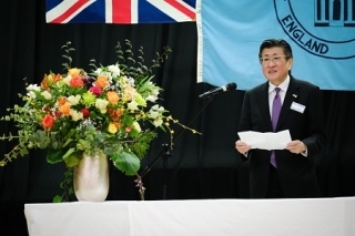 Consul General delivering address