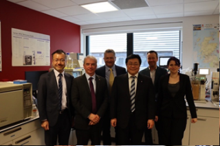 Minister Nishimura (center right) together with Celtic Renewables staff members