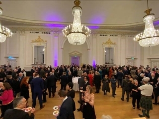 Attendees enjoying reception