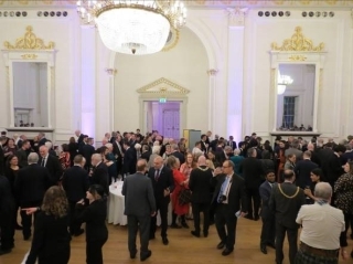 Attendees enjoying reception