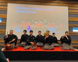 Denzaemon (middle right) and Denjiro (far left) with kabuki musicians
